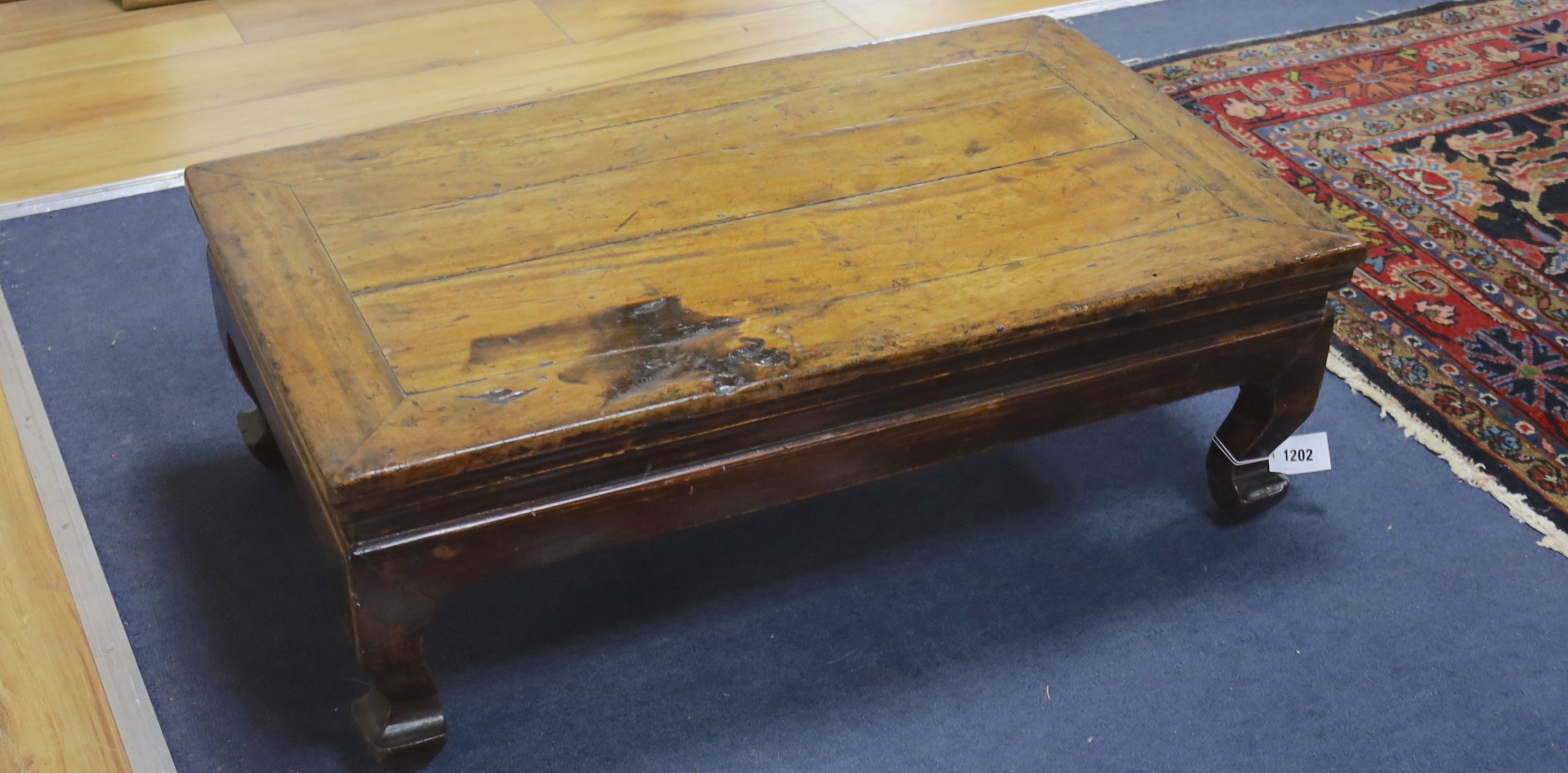 A 19th century Chinese wood Kang table, width 78cm, depth 46cm, height 27cm